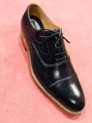 Pure Black With Brown Sole